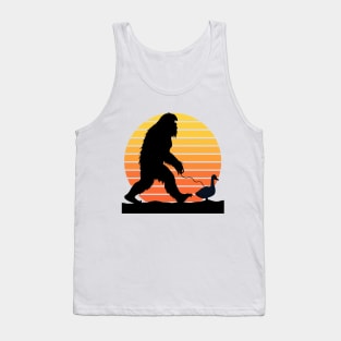 Bigfoot walking a duck on a leash Tank Top